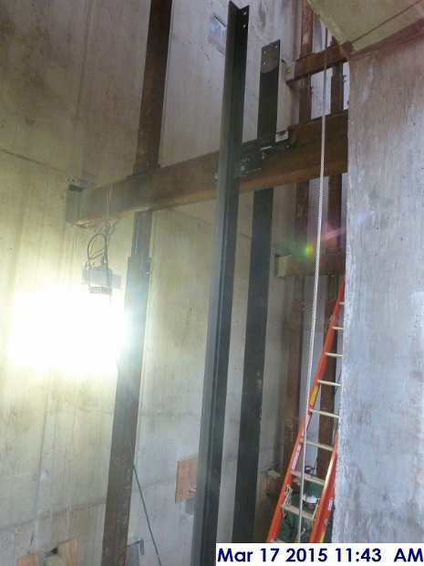 Continued installing the elevator guide rails at Elev. 1,2,3 Facing West